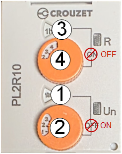 Orange wheel Crouzet relay timer with numbered position markers